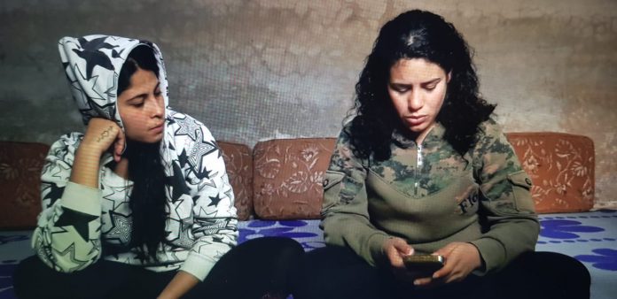 Hala with her sister